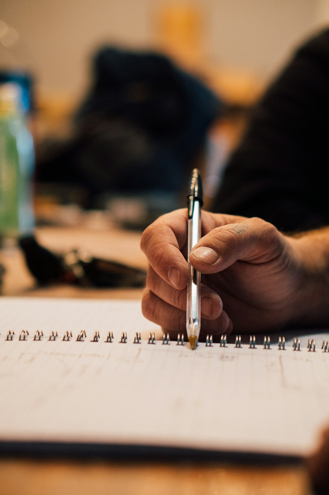 person setting goals on paper